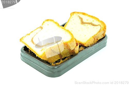 Image of some slices of sponge cake with chocolate chips