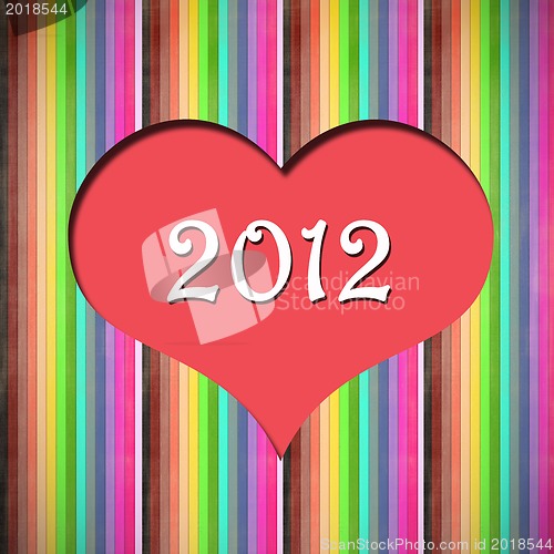 Image of  heart isolated on rainbow background.