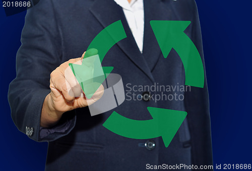 Image of business man recycled sign.