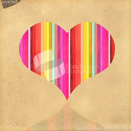 Image of  heart isolated on rainbow background.