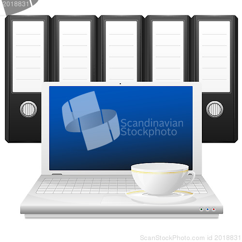 Image of Laptop with cup and binders.