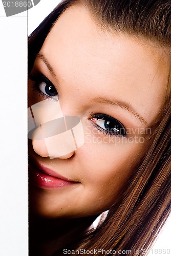 Image of Beautiful Brunette Woman With Blank Banner.