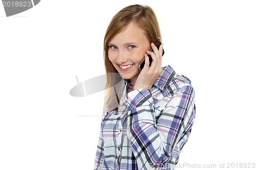 Image of Pretty girl talking to her boyfriend on mobile