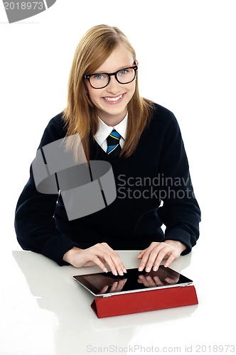 Image of Student operating new touch screen tablet device