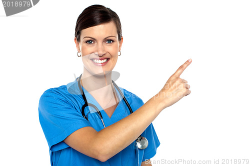 Image of Doctor pointing away with her index finger