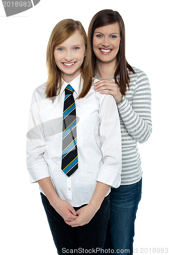 Image of Blonde mother and daughter posing together