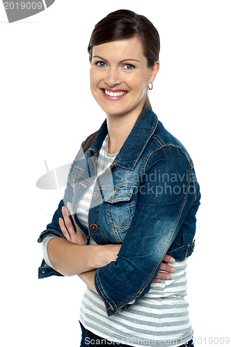 Image of Cheerful middle aged woman in trendy clothing