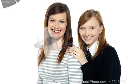 Image of Daughter resting hands on mothers shoulders