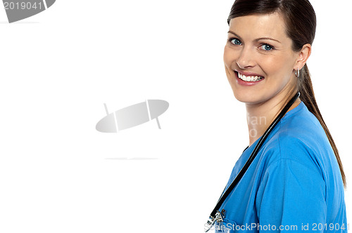 Image of Smiling doctor with stethoscope around her neck