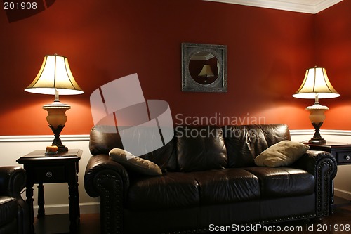 Image of Inside the Living Room with a Couch and Lamps