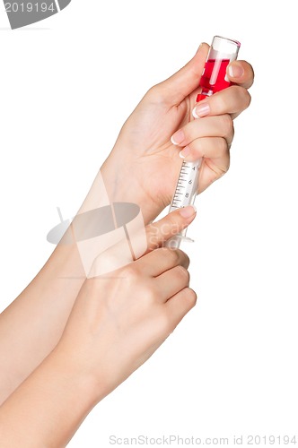 Image of Hand with syringe