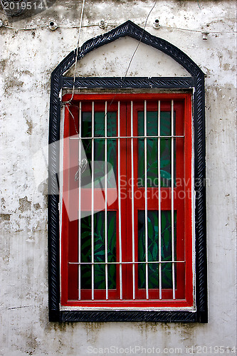 Image of stone town and a old window closed