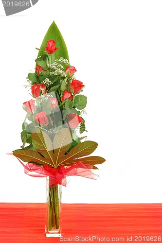 Image of bouquet of red roses in vase