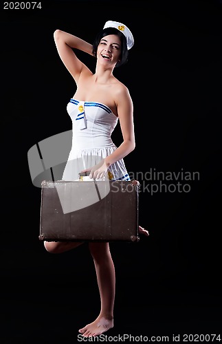 Image of Young sailor with suitcase