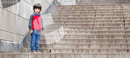 Image of boy on the stairs