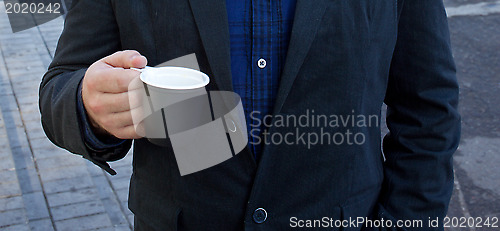 Image of street coffee in a plastic cup