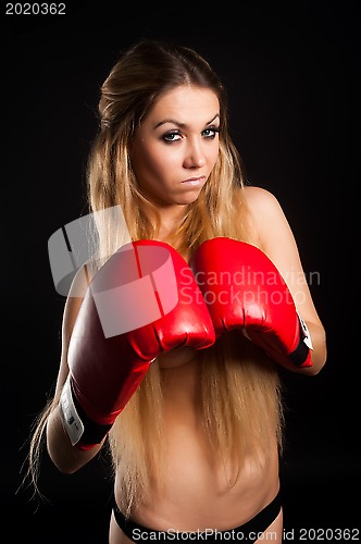 Image of beautiful nude girl with boxing gloves