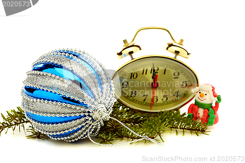 Image of Christmas card with clock, snowman and blue ball.