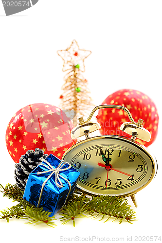 Image of Hours, Christmas tree and red balls.