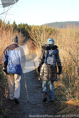 Image of Old couple out hiking