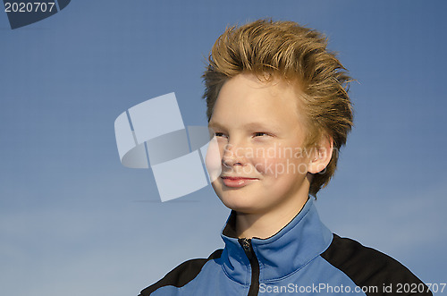 Image of Teenager against blue sky background