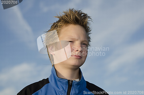 Image of Guy against blue sky background