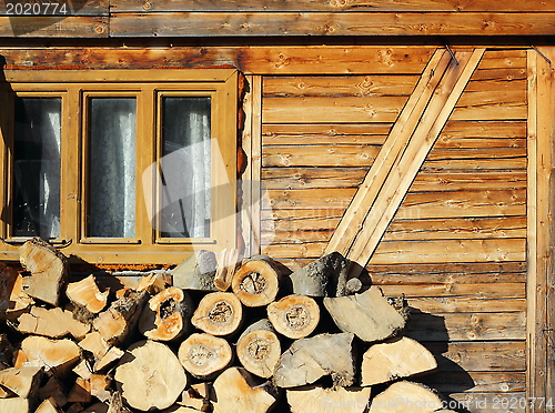 Image of firewood near a lodge