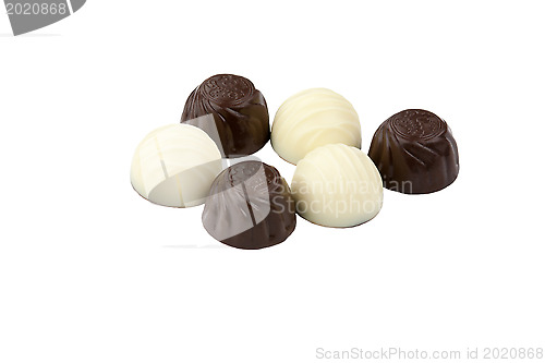 Image of black and white chocolate on white background