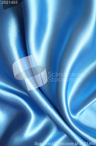 Image of Smooth elegant blue silk as background