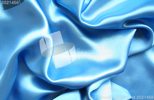 Image of Smooth elegant blue silk as background