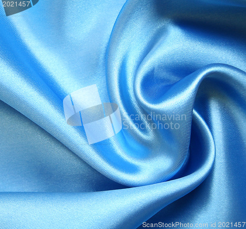 Image of Smooth elegant blue silk as background