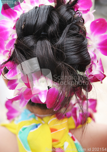 Image of Tropical girl with fancy hairstyle