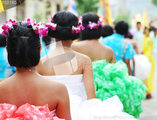 Image of Tropical dancers prepare to perform a traditional dance