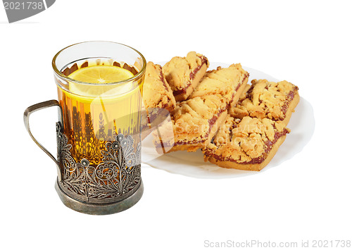 Image of Tea cup and cookies