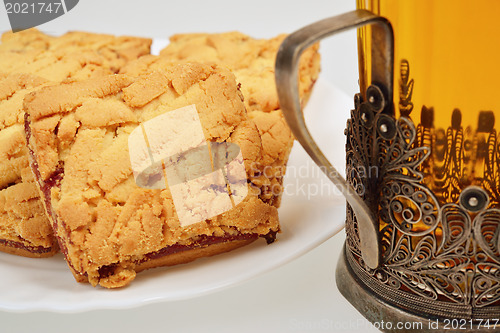 Image of Tea cup and cookies