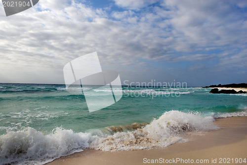 Image of Caribbean beach on cloudy day 