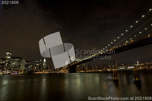 Image of Brooklyn Bridge and Manhattan skyline At Night