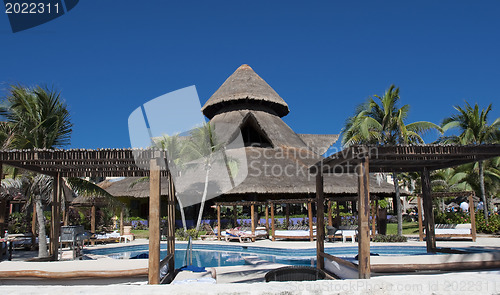 Image of Resort pool side with plank bed