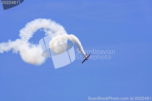 Image of A plane performing in an air show 