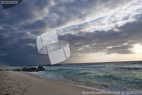 Image of Caribbean beach on cloudy day 