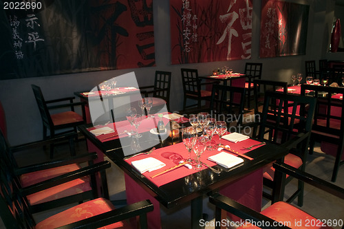 Image of Restoraunt table set awaiting guests