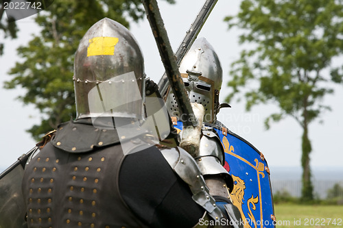 Image of PORT WASHINGTON, NY - JULY 11: Performers in sword fighting acti