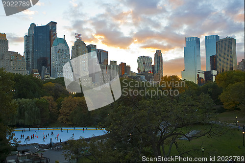 Image of  New York City skyline .Ice Skate rink