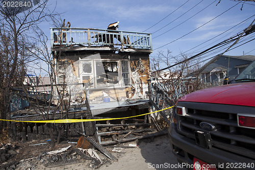 Image of NEW YORK -November12: The fire destroyed around 100 houses durin