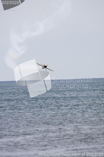 Image of A plane performing in an air show at Jones Beach