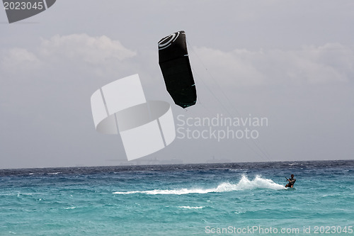 Image of Kite surfer with the kite waiting for the wind