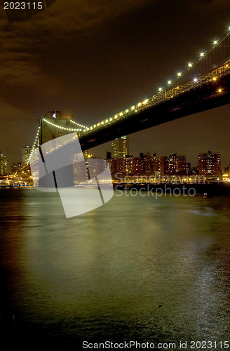 Image of Brooklyn Bridge and Manhattan skyline At Night