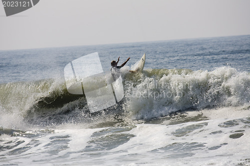 Image of Backlit surfer