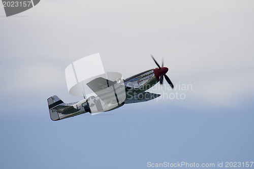 Image of A plane performing in an air show 