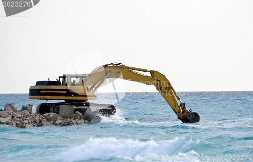 Image of Yellow Excavator at Work